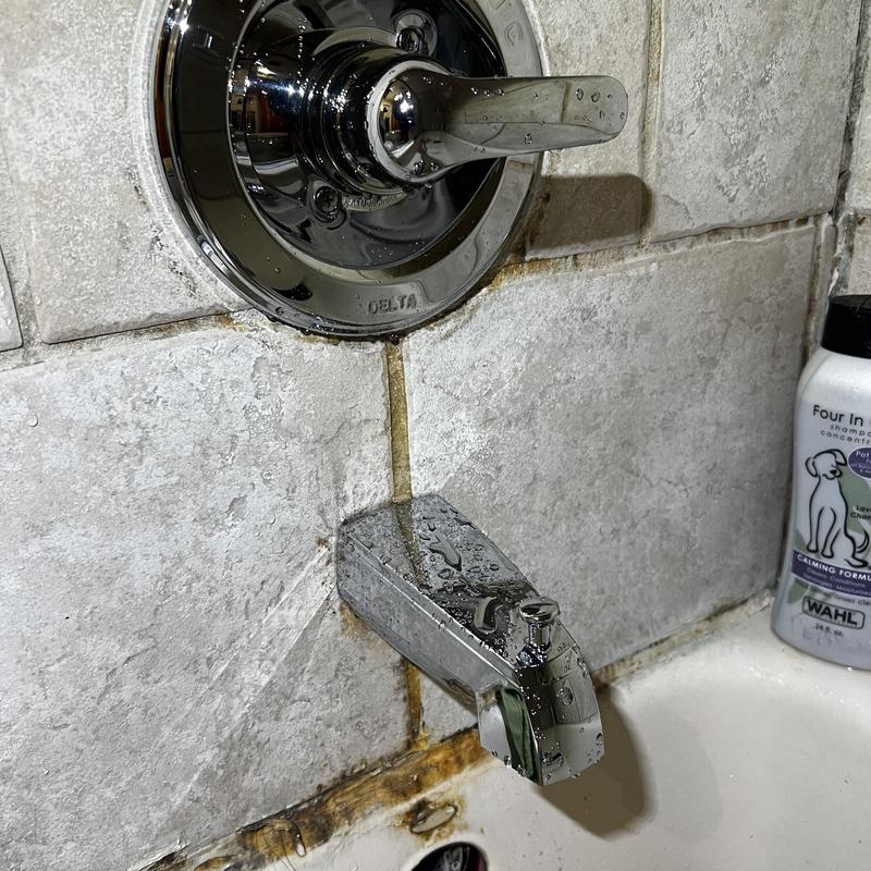 Delta tub and shower valve with water droplets