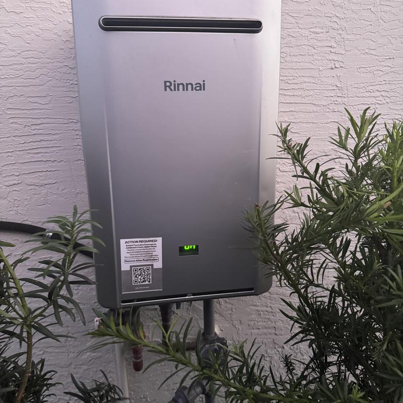 Tankless water heater with diagnostic display outdoors