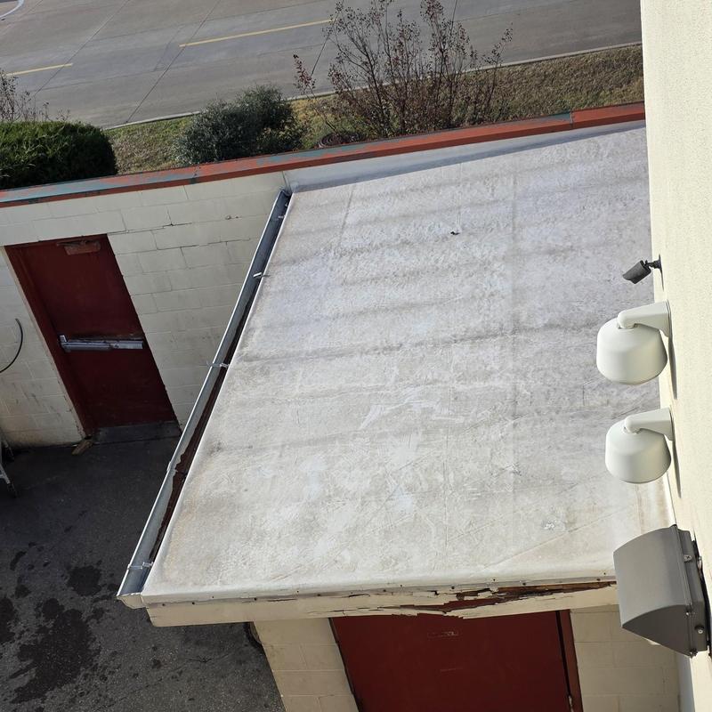 Flat roof membrane with potential hail damage inspection Flat roof membrane with potential hail damage inspection