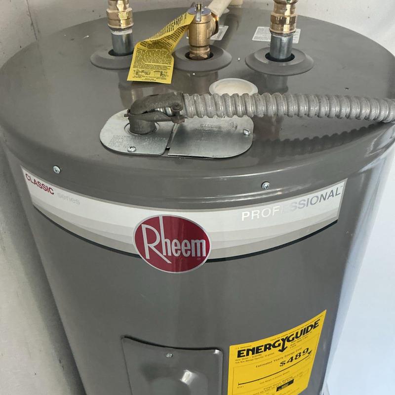 Rheem electric water heater with plumbing connections