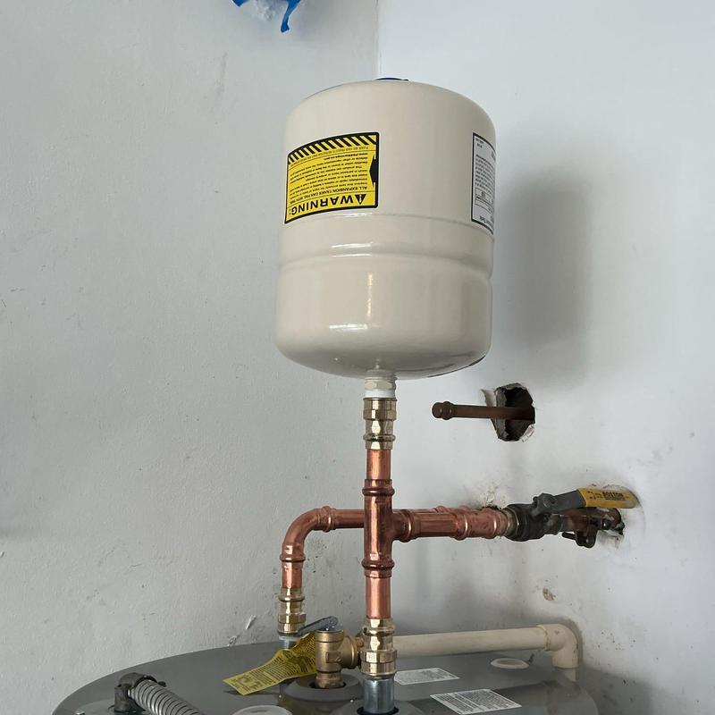 Expansion tank and copper piping on water heater