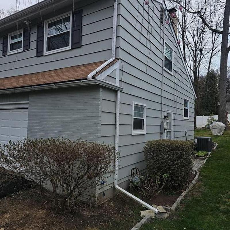 Seamless 5K gutters installed on residential home exterior Seamless 5K gutters installed on residential home exterior