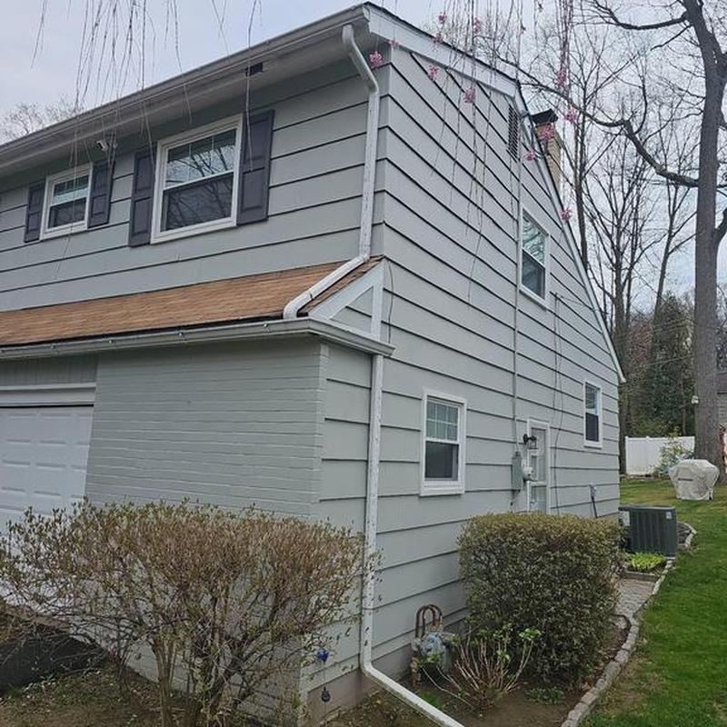 Seamless 5K gutters on residential home exterior Seamless 5K gutters on residential home exterior