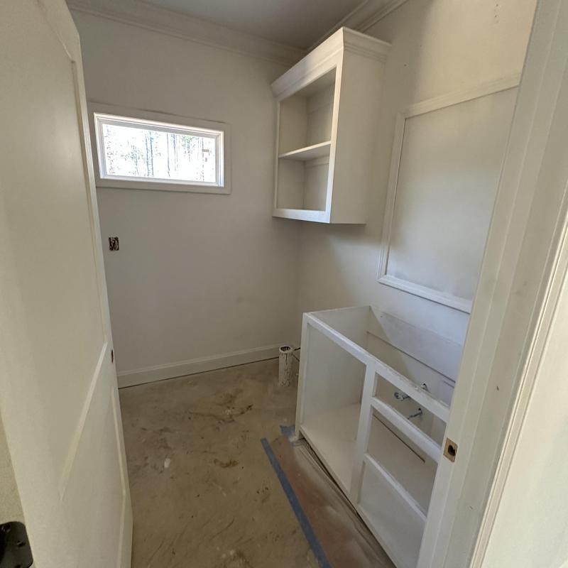 Cabinet walls and trim painting prep in laundry room Cabinet walls and trim painting prep in laundry room