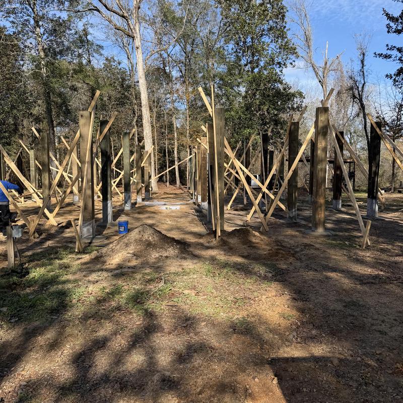 10x10 wooden posts with concrete footings on site 10x10 wooden posts with concrete footings on site