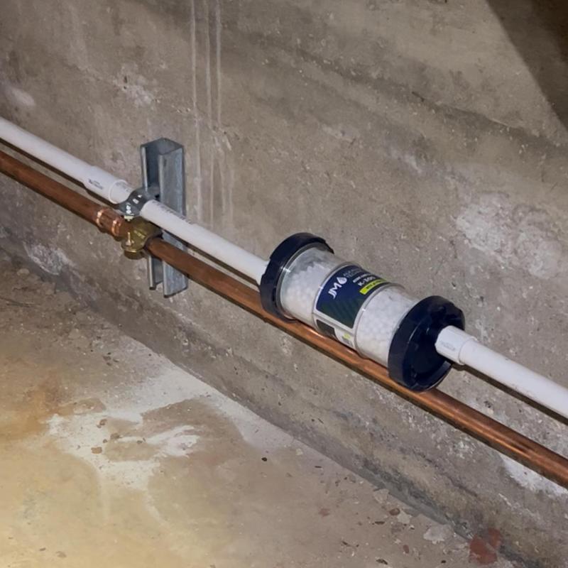 Water softener salt filter installed on water line