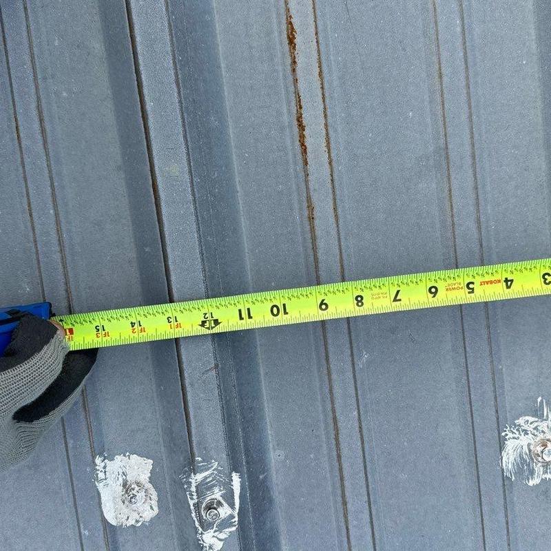 Metal roof panel measuring tape for hail damage assessment
