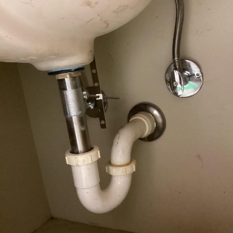 Lavatory faucet drain pipe and supply line connection
