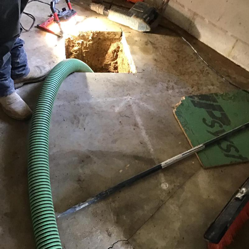 Septic tank pumping with installed risers and lid