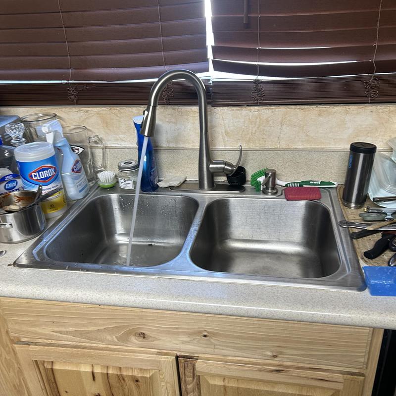 Kitchen sink drain and faucet with running water
