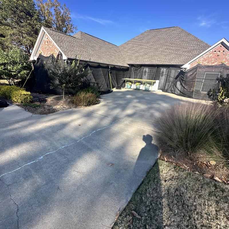 Catch All debris containment system around house exterior