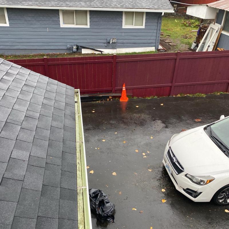 Gutter cleaning and leaf removal on residential roof