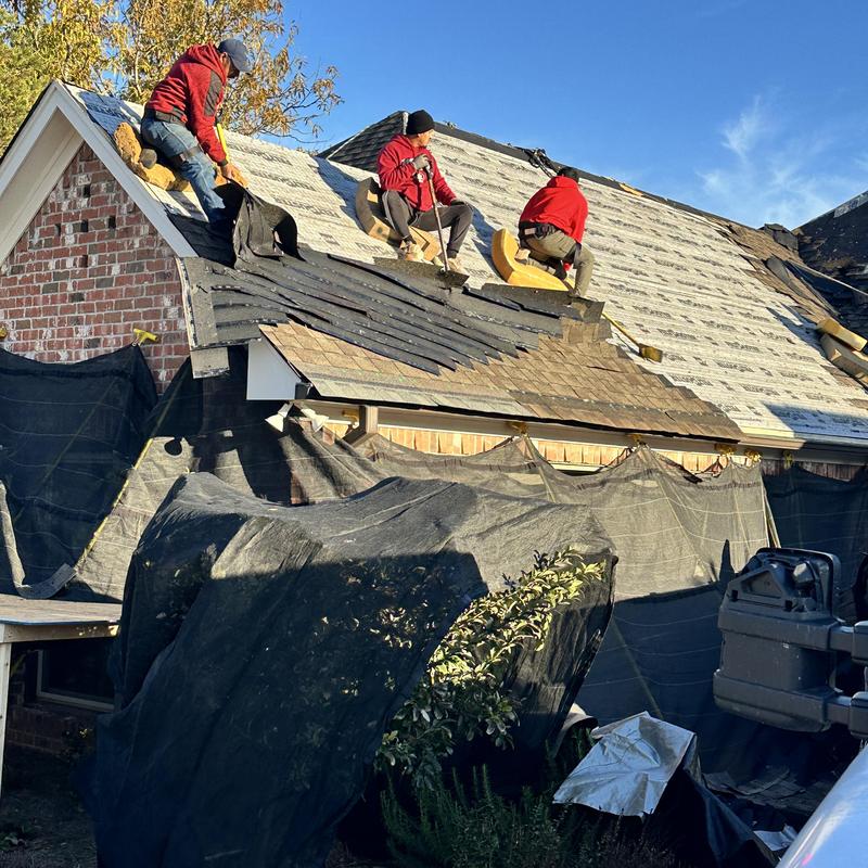 Roof shingles tear off on residential house