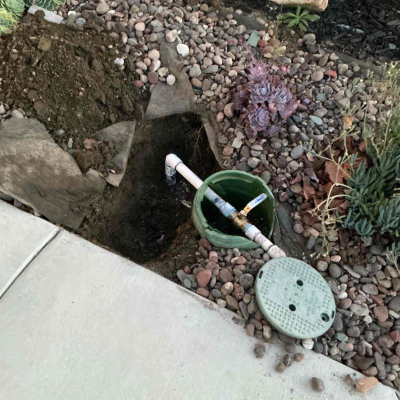 1-inch PVC line with ball valve repair in front yard