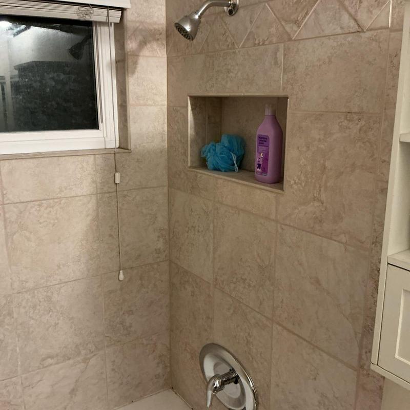 Shower valve with Moen shower head and spout