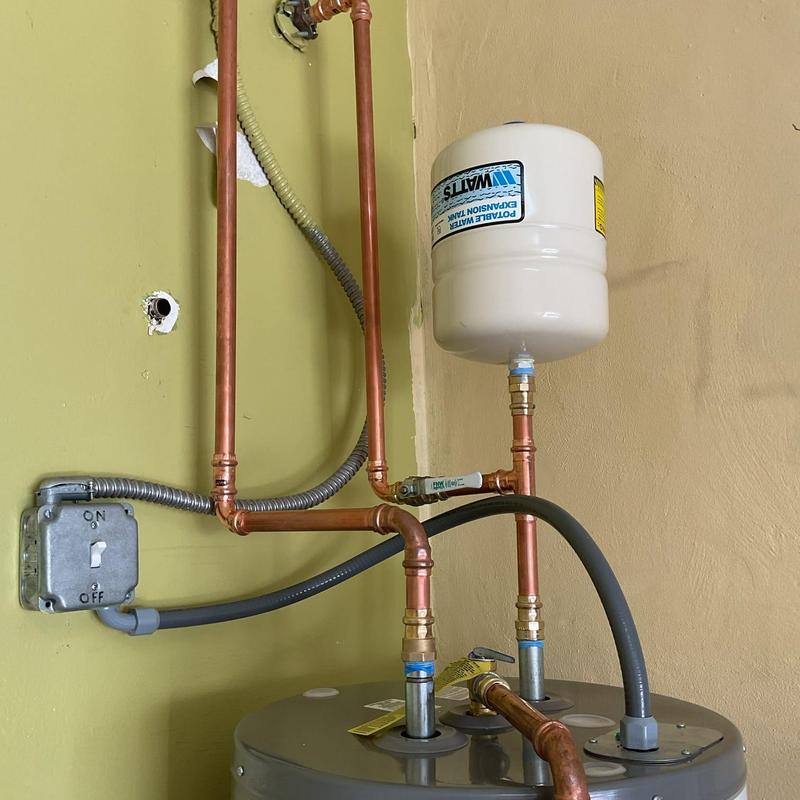 Water heater expansion tank and copper piping installation