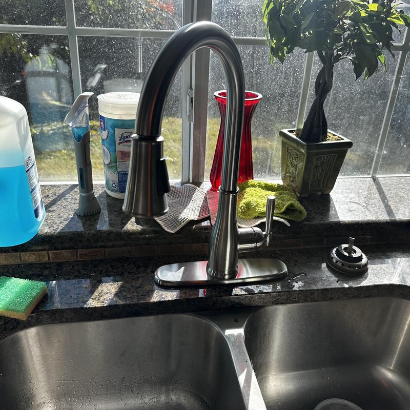 Kitchen faucet installation with sealed water connections