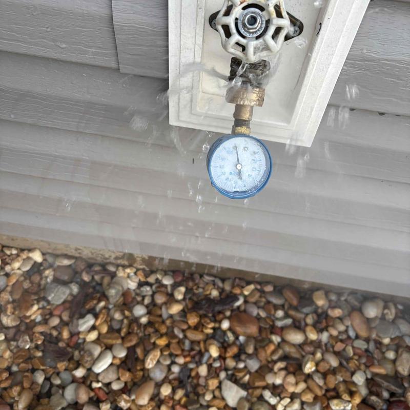 Pressure relief valve with attached water pressure gauge