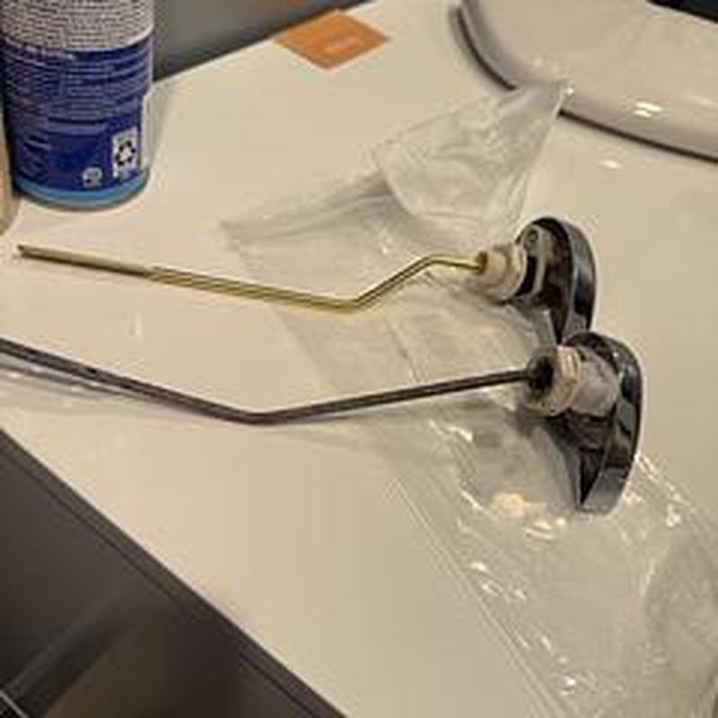 Toilet flush handles replacement parts on counter