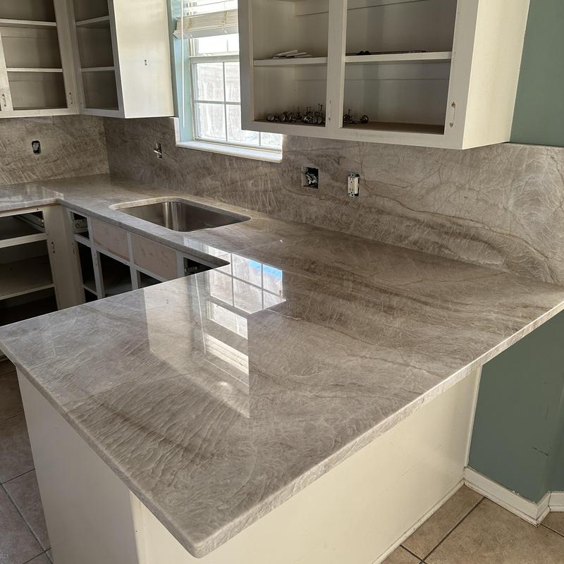 Granite kitchen countertop with integrated sink installed Granite kitchen countertop with integrated sink installed