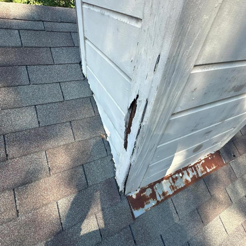 Chimney wooden siding damage and roof shingles inspection Chimney wooden siding damage and roof shingles inspection