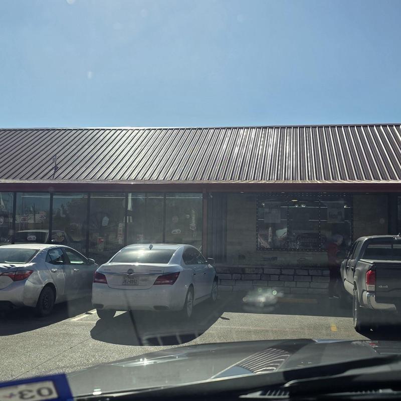 Metal roof with storm damage in commercial building Metal roof with storm damage in commercial building