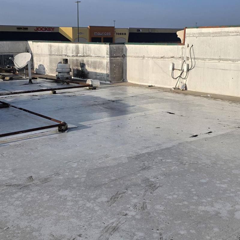 Flat roof storm damage inspection on commercial building Flat roof storm damage inspection on commercial building