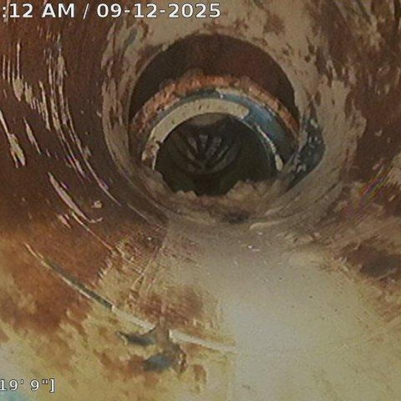 Sewer line interior showing broken pipe segment