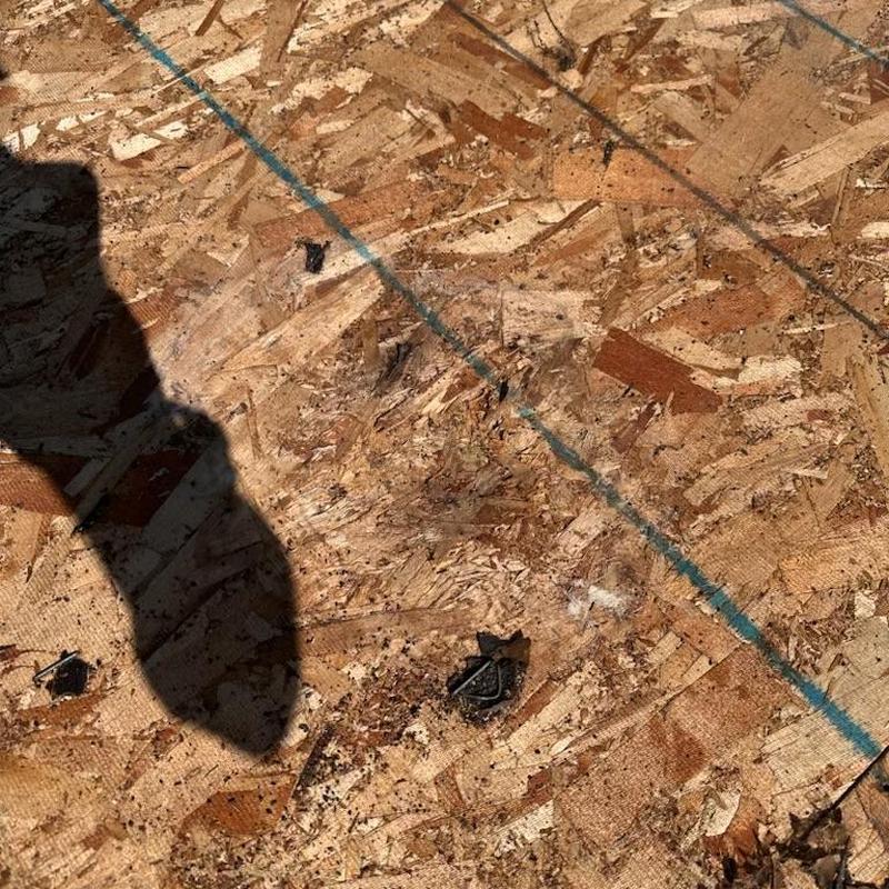 Oriented strand board roof decking with layout markings