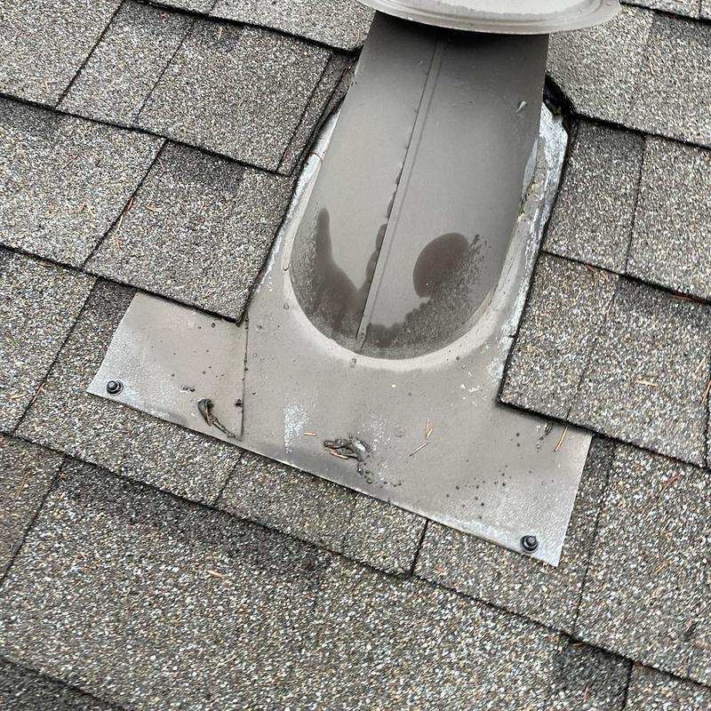 Roof exhaust vent with secured flashing and fasteners