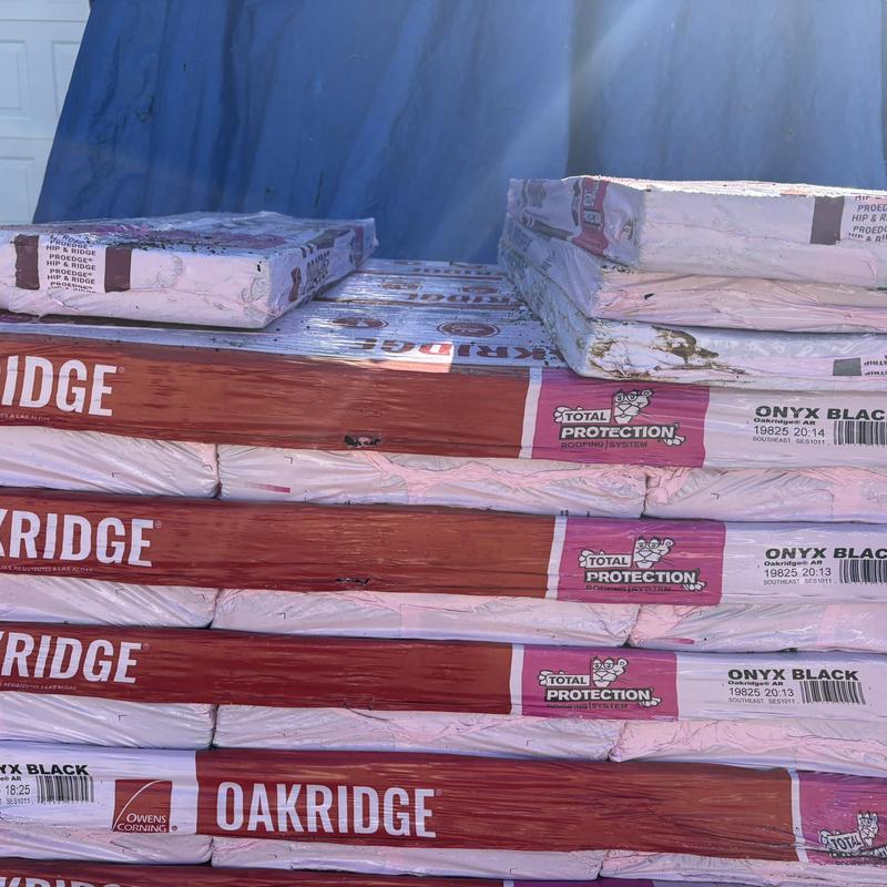 Oakridge roofing shingles stacked and wrapped for installation