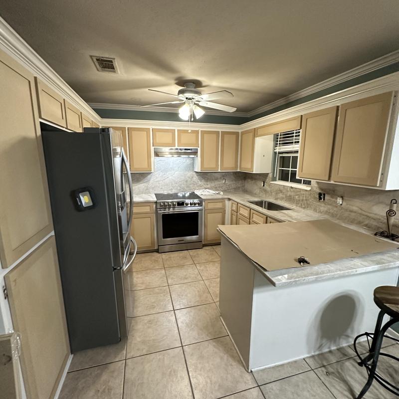 Cabinet doors and drawers installed in kitchen Cabinet doors and drawers installed in kitchen