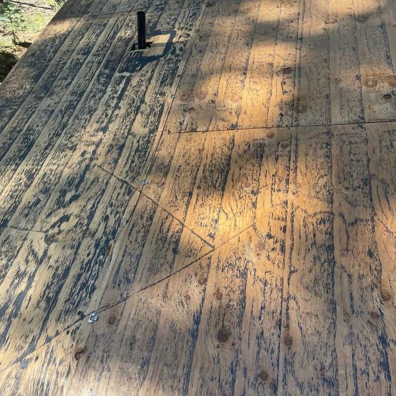 Roof plywood decking with pipe vent flashing prep