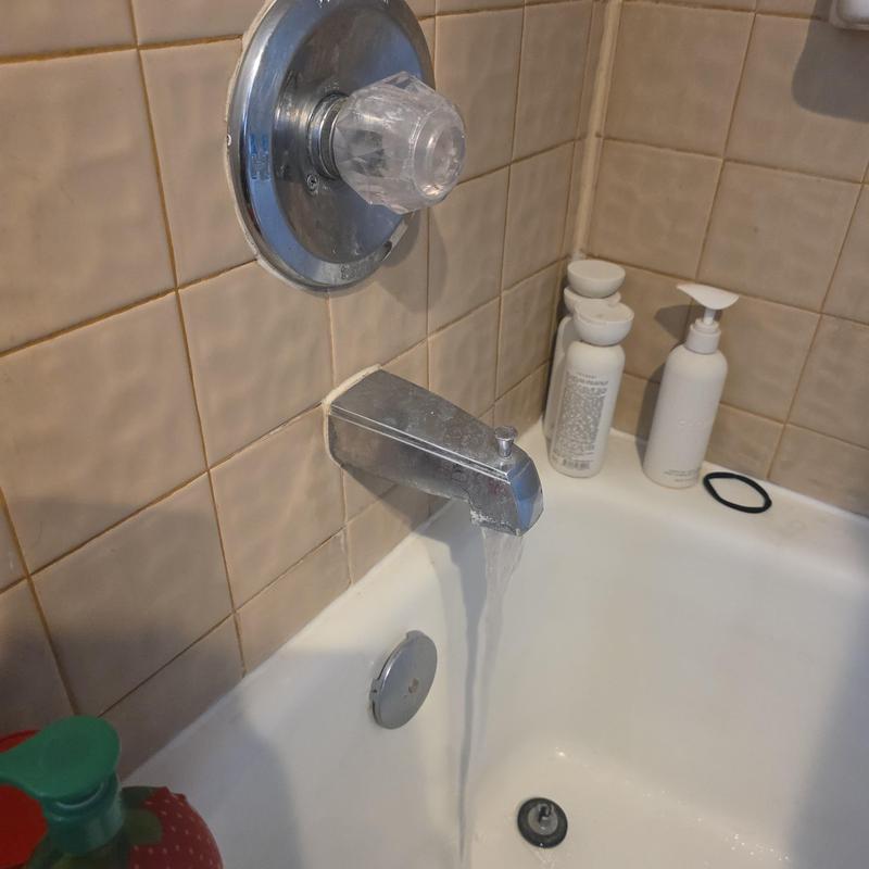 Delta shower valve and tub spout with flowing water
