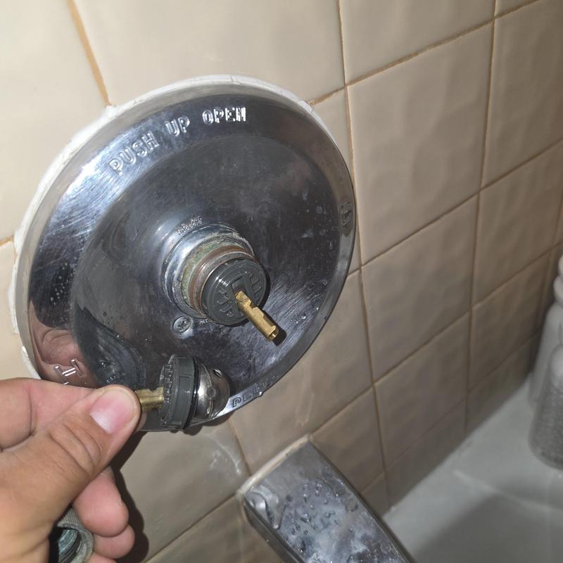 Delta shower valve with handle removed for repair