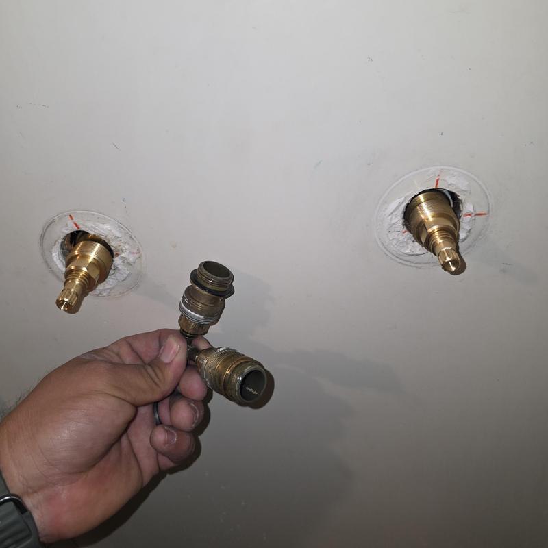 Shower valve stems removed for leak repair