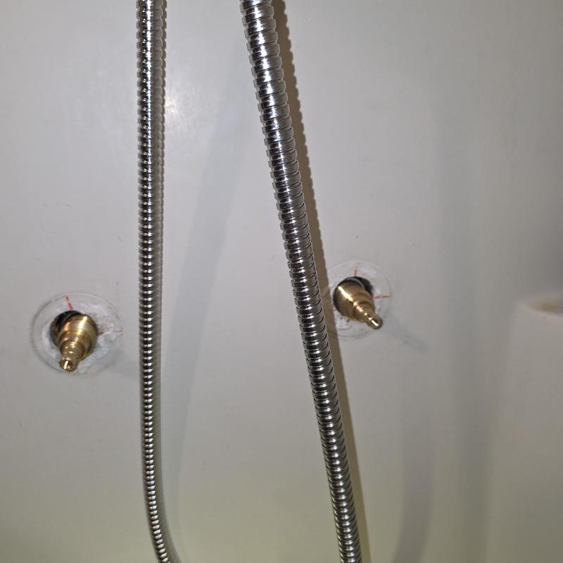 Shower valve brass stems installed, no leaks detected