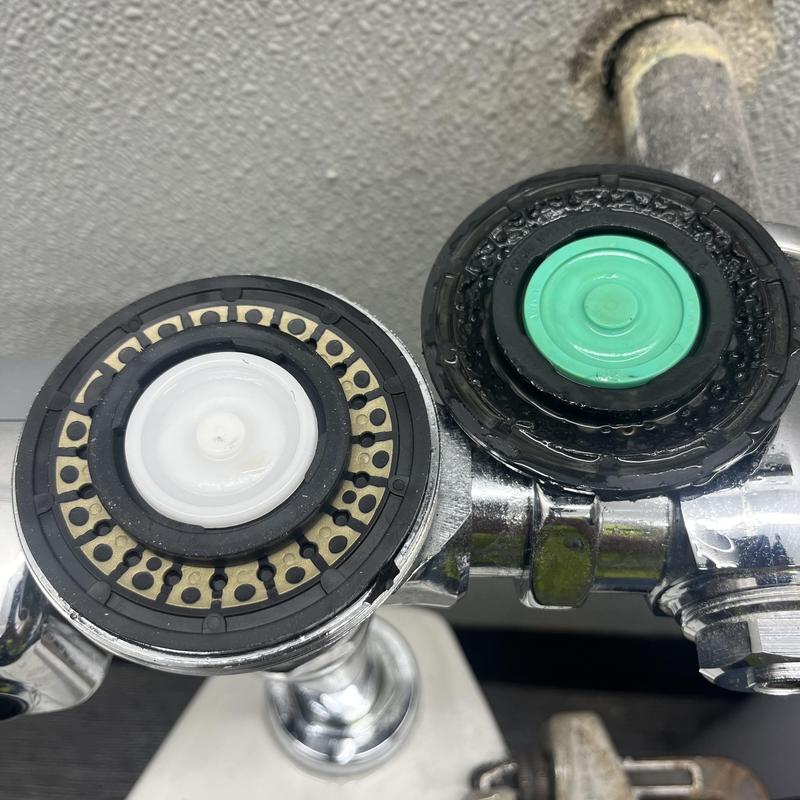 Flush valve assembly with rebuilt valve components