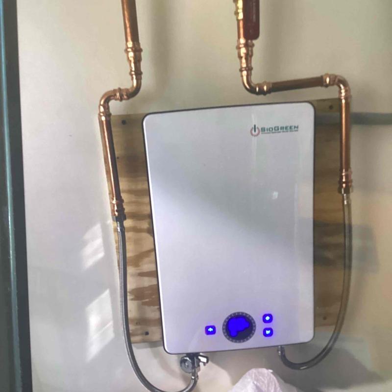 Tankless water heater with new copper piping installation