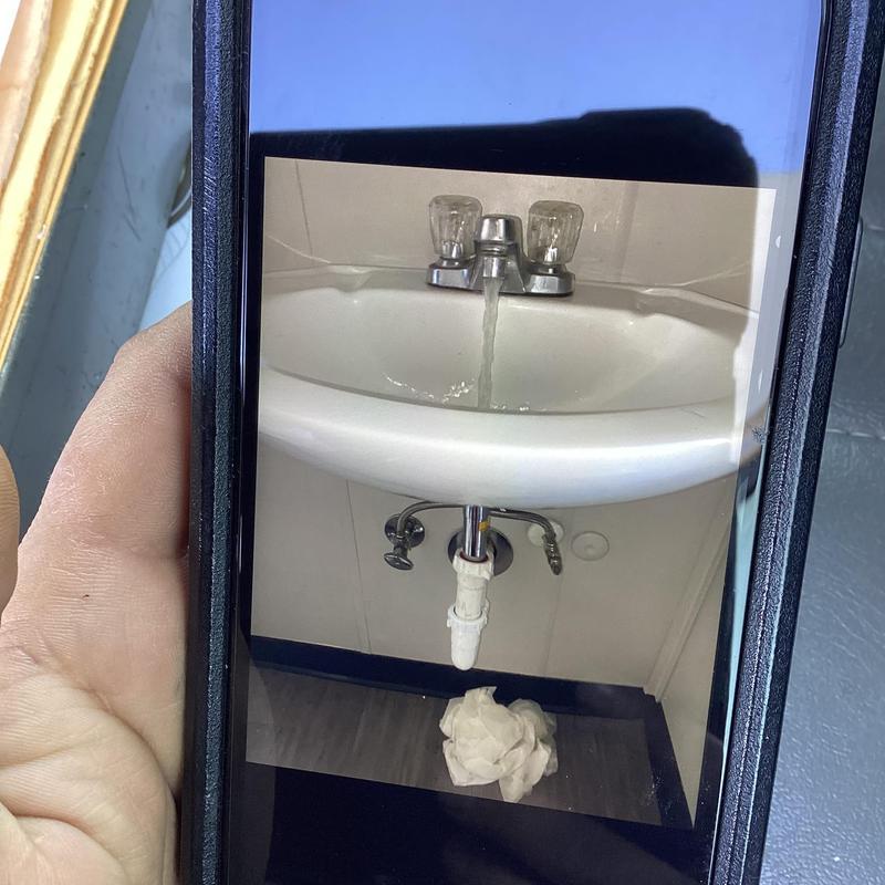 Bathroom sink P-trap installation and leak test