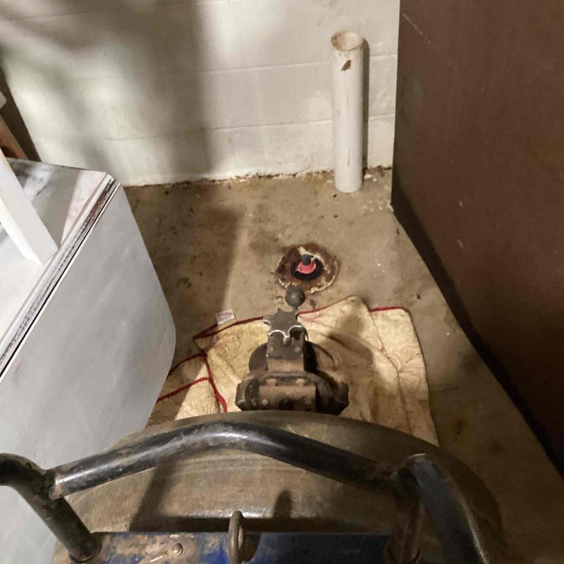 Mainline sewer cable inserted at cleanout pipe