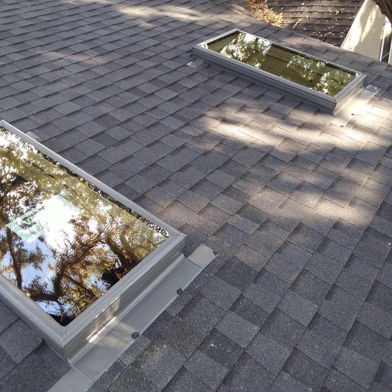 VELUX skylights with flashing on asphalt roof