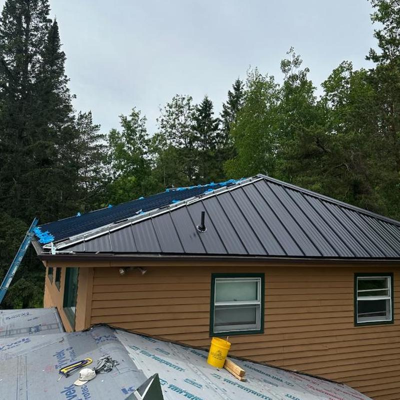 26-gauge Image II standing seam steel roof installation 26-gauge Image II standing seam steel roof installation