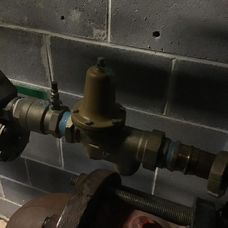Pressure reducing valve assembly on water line