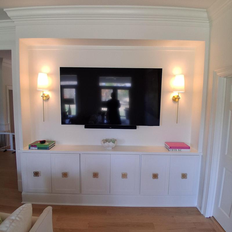 Cabinet base with crown molding and wall sconces installation Cabinet base with crown molding and wall sconces installation