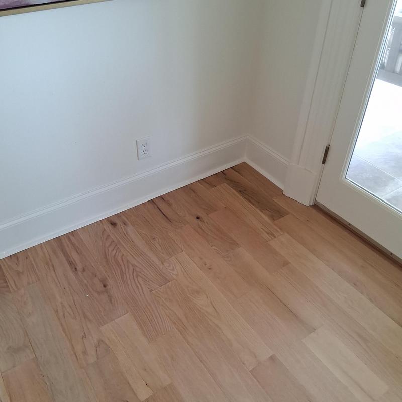 Baseboard molding and quarter round installation near door Baseboard molding and quarter round installation near door