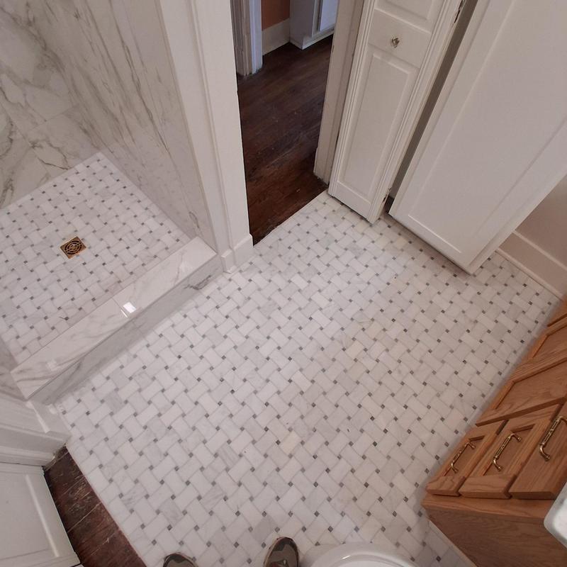 Marble tile floor and shower base in bathroom remodel Marble tile floor and shower base in bathroom remodel
