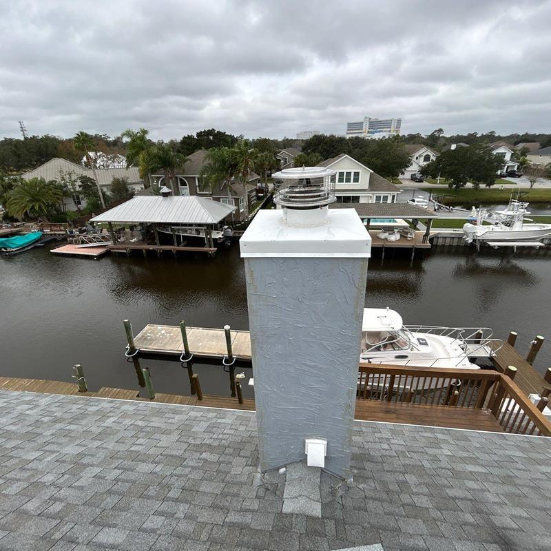 Aluminum chimney chase cover and stainless flue cap installation Aluminum chimney chase cover and stainless flue cap installation