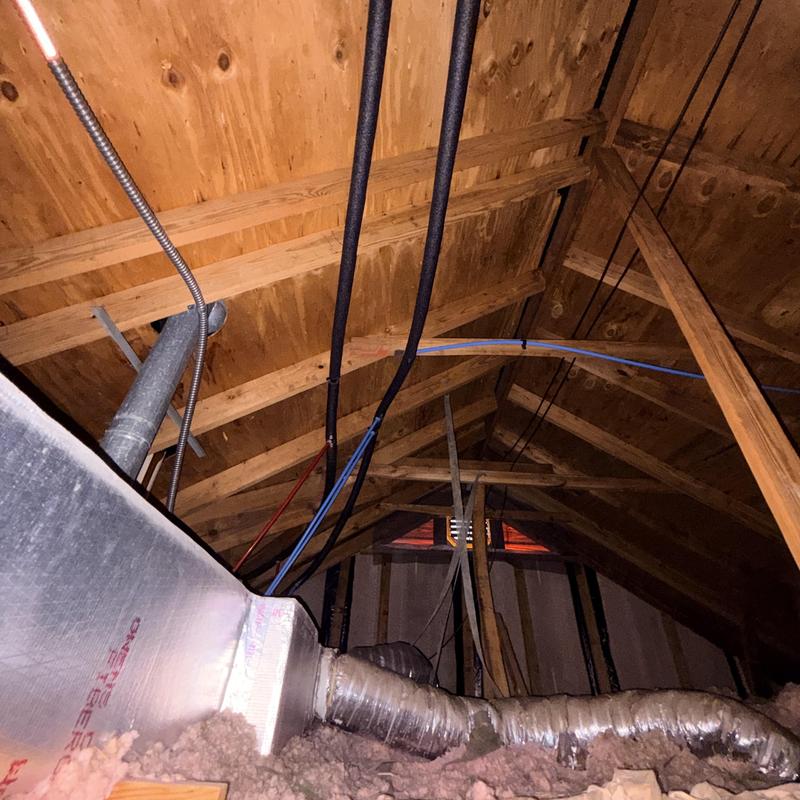 PEX piping installation in attic water system