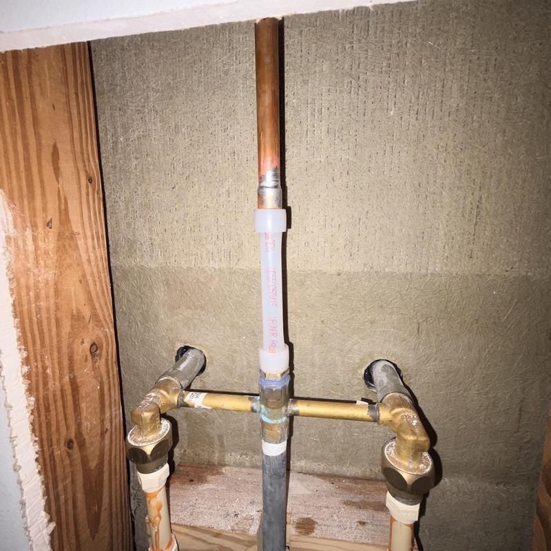 Shower valve piping with Uponor PEX-A pipe repair
